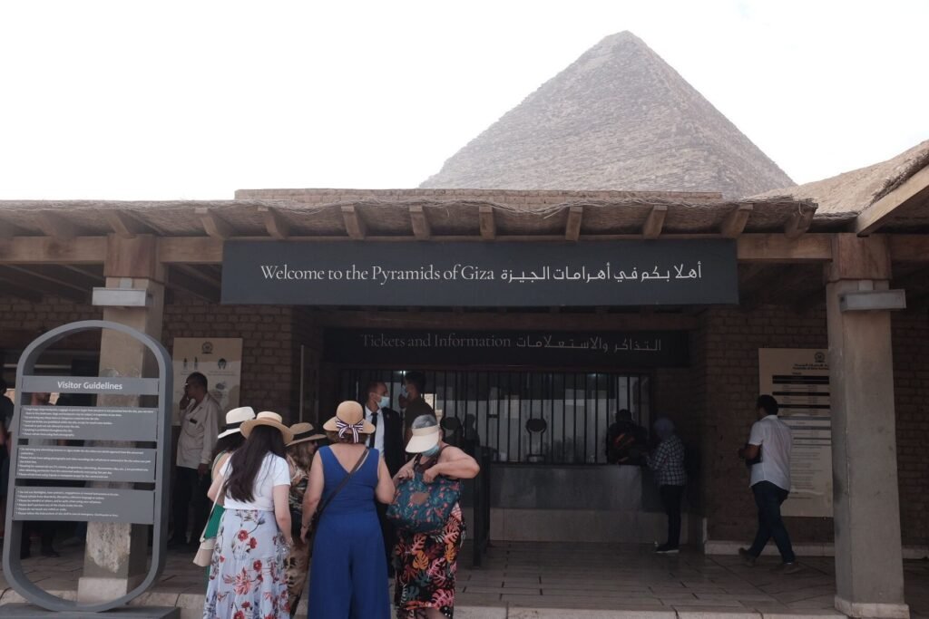 A group of tourists await for their tickets to enter the Giza Plateau.