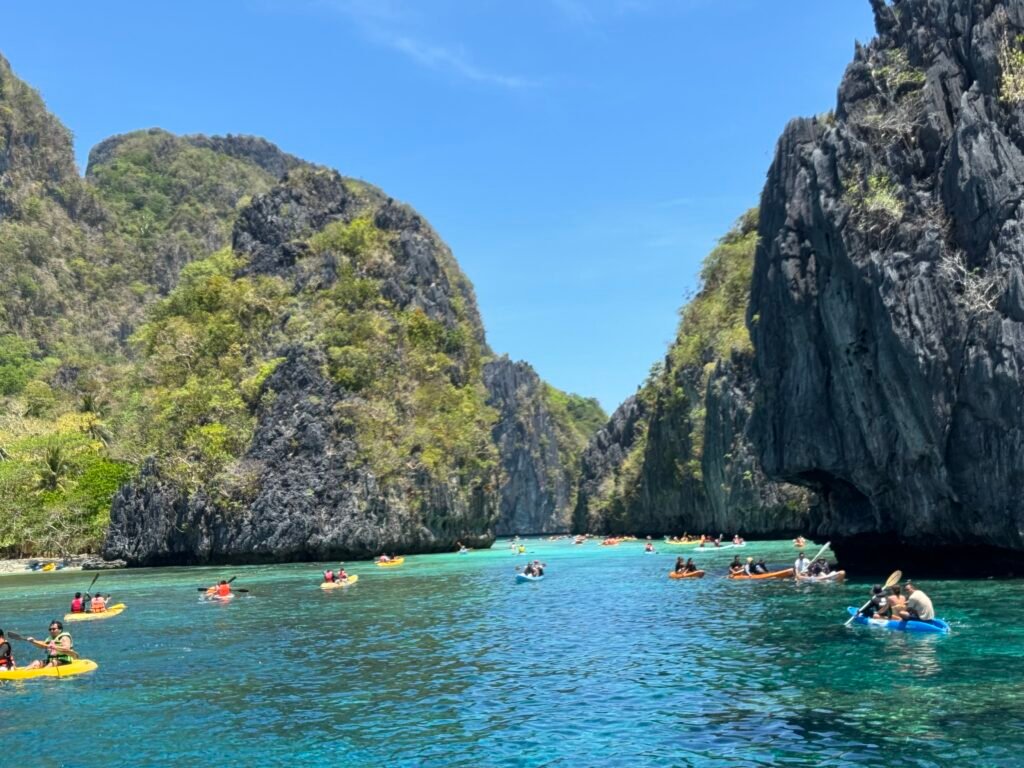 Big Lagoon entrance where several tourists can be seen paddling their kayak in and out of the lagoon.